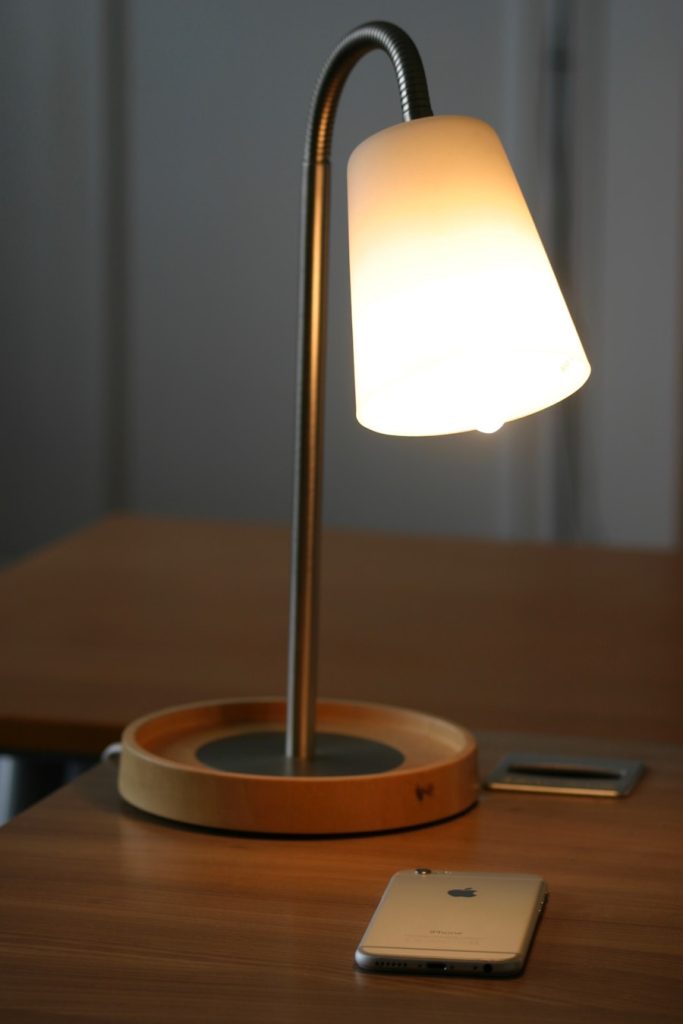 Photo "Nickel shaft table lamp can be used in modern office"